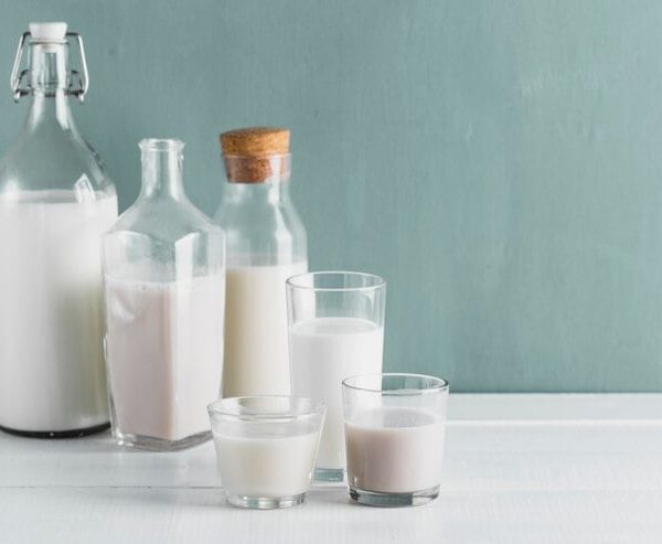 set-milk-bottles-glasses_23-2148356817